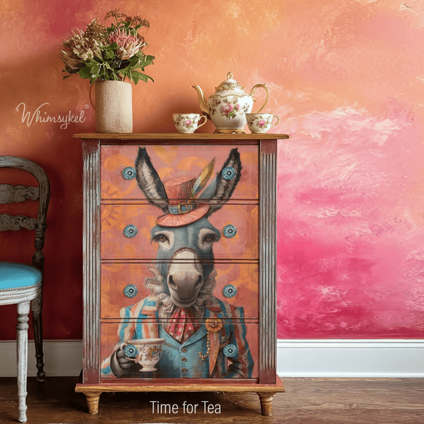 Decorative cabinet with donkey design and 'Time for Tea' text, against a pink and orange wall.